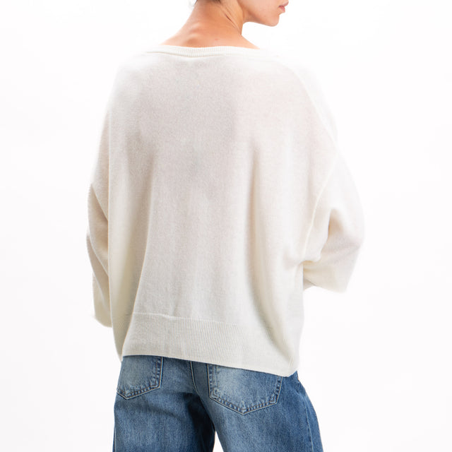 Tension in-V-neck wool sweater with cut out 100% wool SOFT - butter